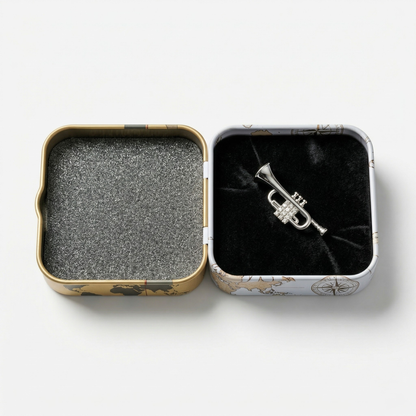 Trumpet lapel pin with premium black gift box on dark background