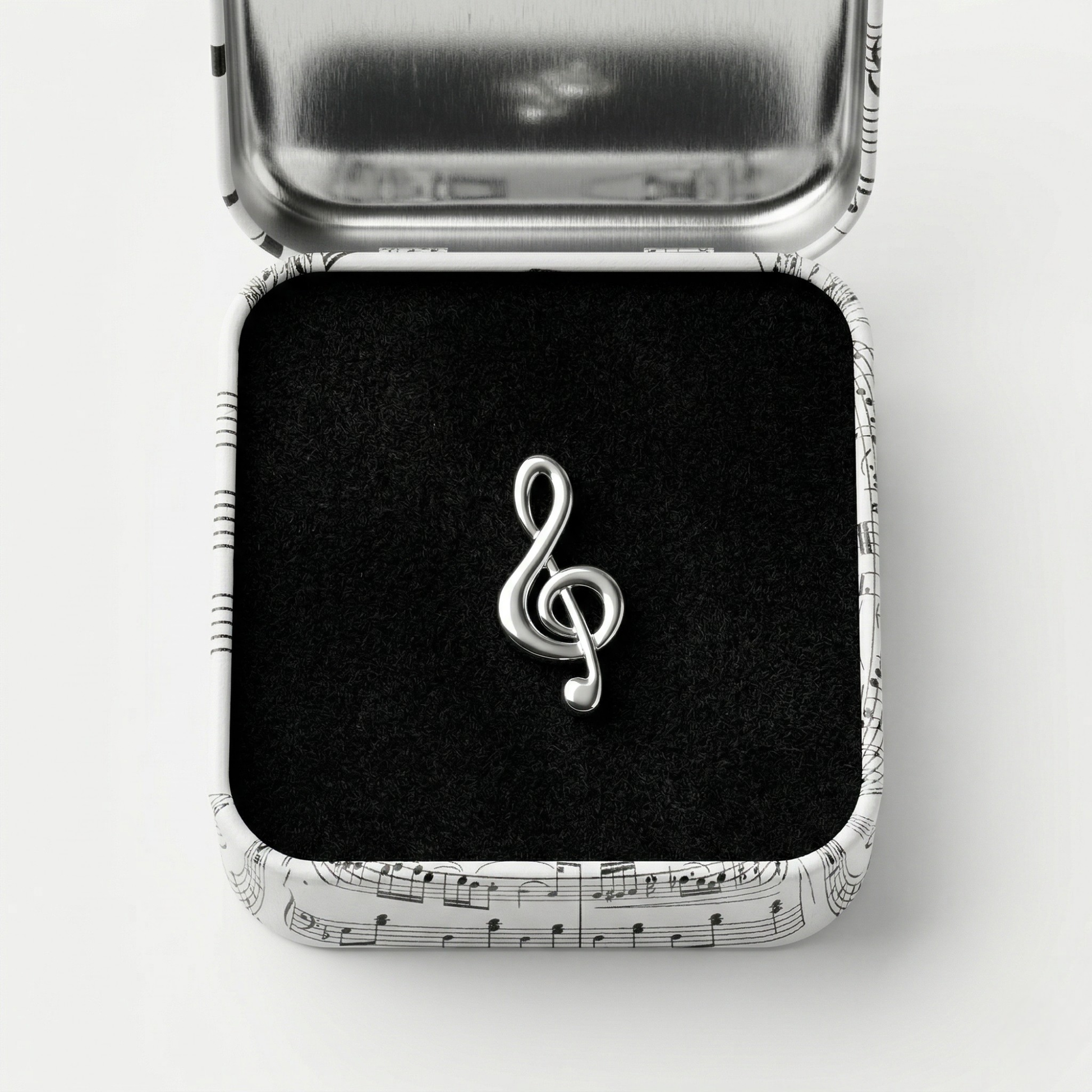 Treble clef lapel pin with premium black gift box on dark background